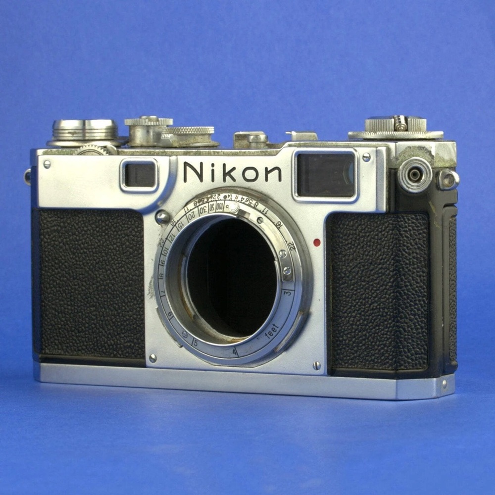 Nikon Vintage Silver and Black Camera